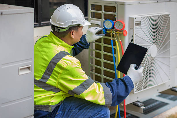 Professional Air Conditioning Repair technician working in Yettem, CA